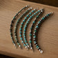 Navajo Pearl + Turquoise Glow Ups on wood surface 