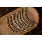 Set of beaded half bracelet on a wooden surface