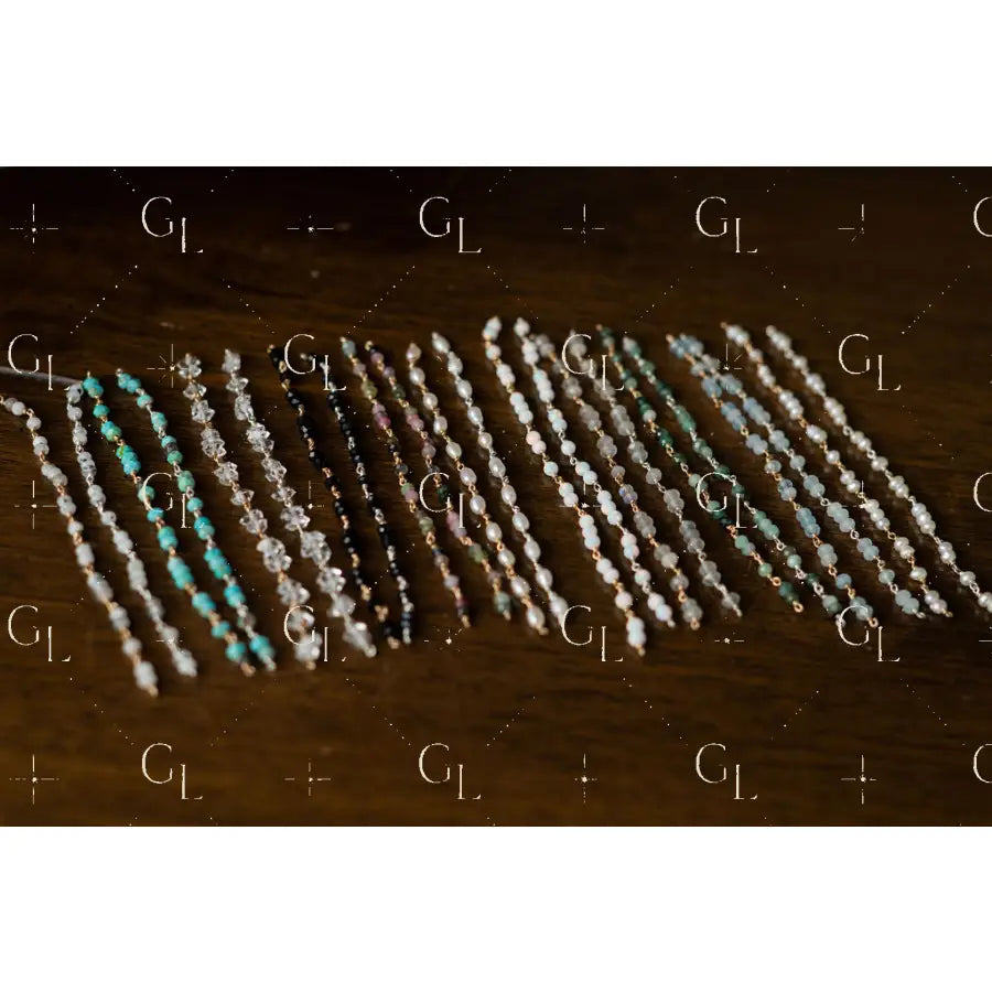 Set of beaded half bracelet on a wooden surface