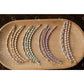 Set of beaded glow up half bead on a wooden surface