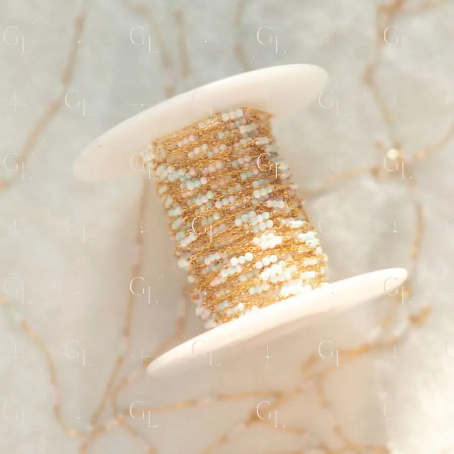 Gold and silver beaded bracelet on a starfish with a marble background