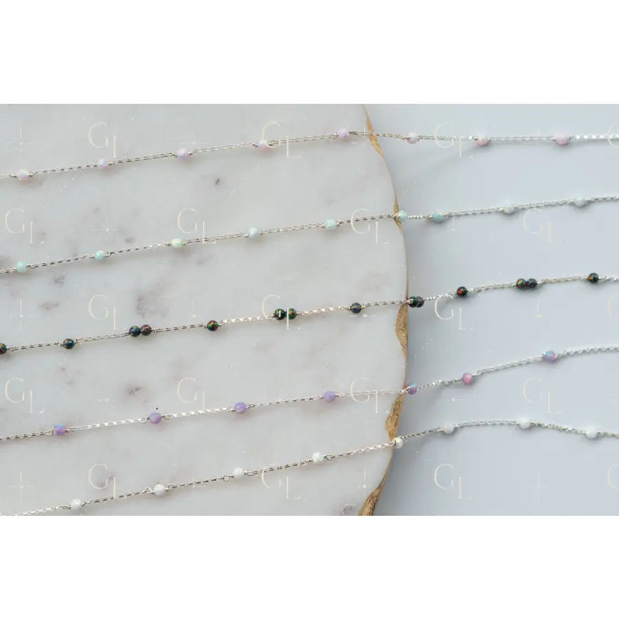 Delicate beaded necklace on a marble surface