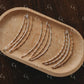 Set of gold and silver glow up on a wooden tray